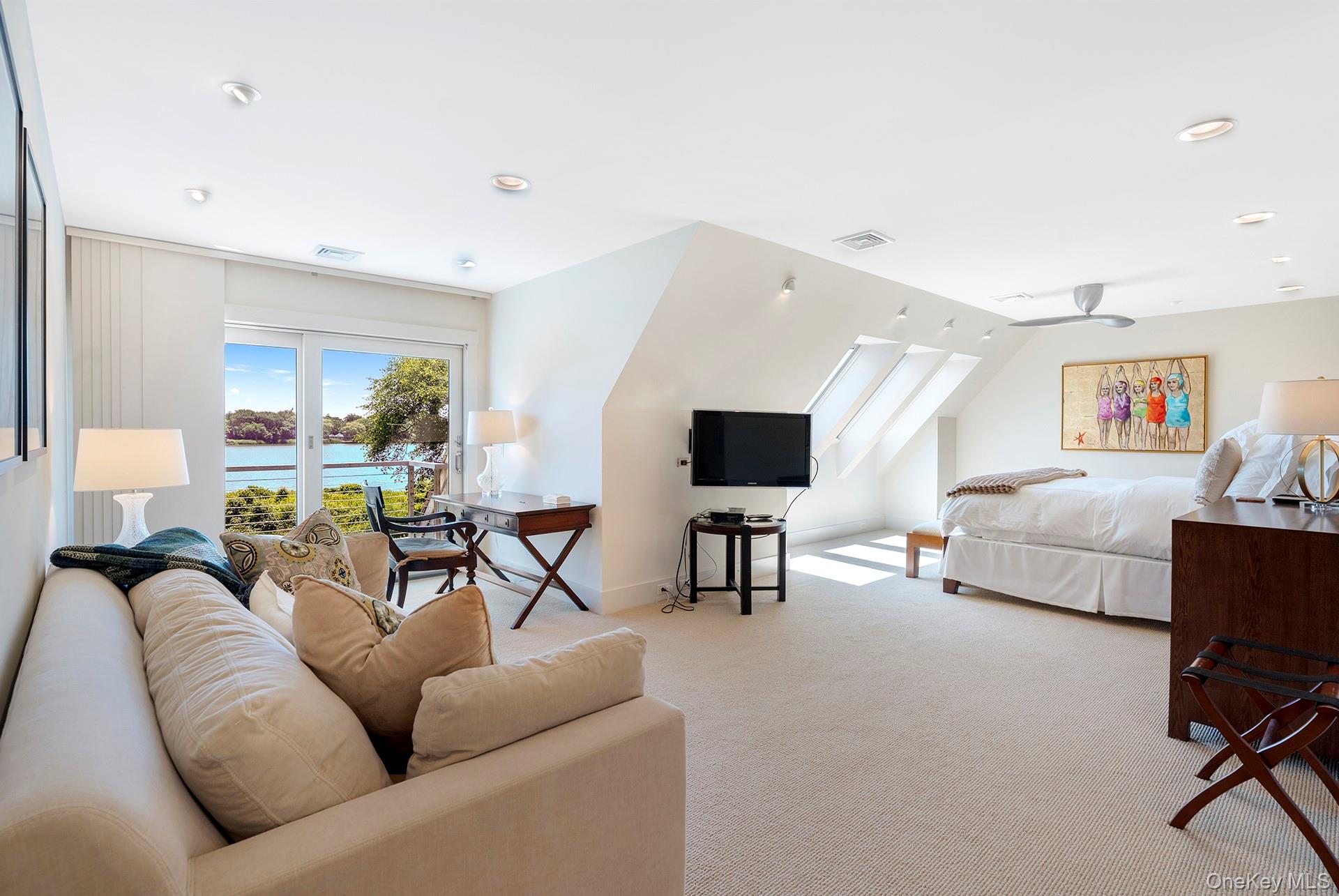 316 Deerfield Road Water Mill, NY 11976 - Photo 18 of 22 a living room with furniture and a flat screen tv