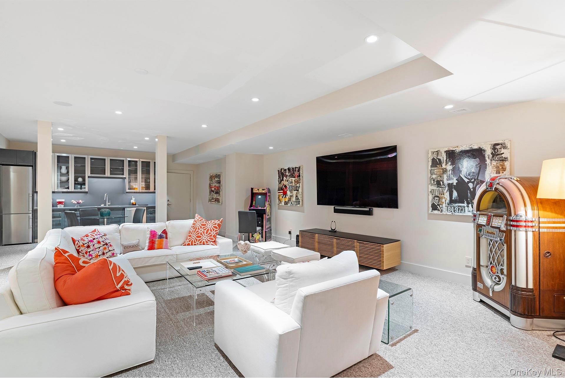 316 Deerfield Road Water Mill, NY 11976 - Photo 19 of 22 a living room with furniture and a flat screen tv