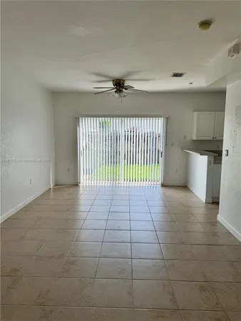 a view of a livingroom with a staircase