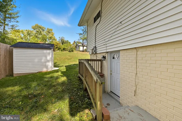 a bedroom with a bed and a sink