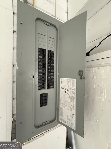 a living room with a fireplace furniture and a fireplace