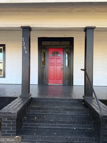 a view of a door of a house with a door