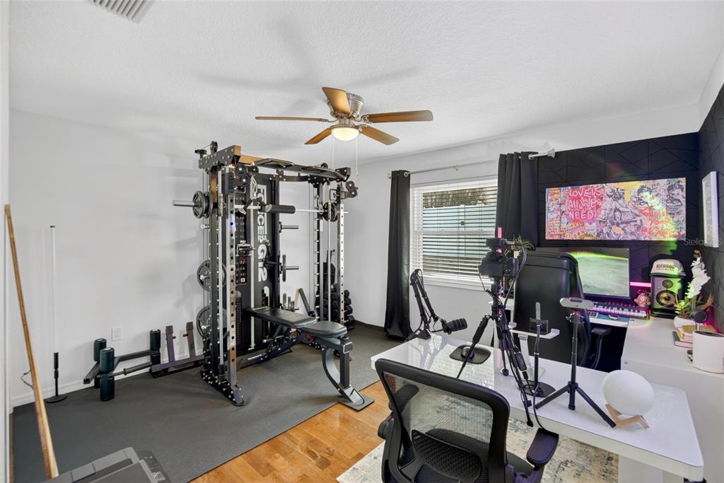 1668 Allens Ridge Drive North Palm Harbor, FL 34683 - Photo 27 of 48 a view of a room with gym equipment