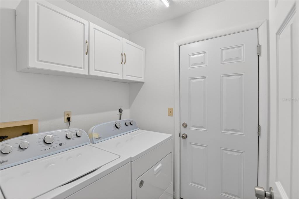 1668 Allens Ridge Drive North Palm Harbor, FL 34683 - Photo 33 of 48 a utility room with dryer and washer