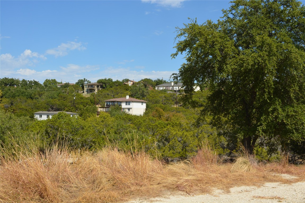 20708 Oak Ridge Lago Vista, TX 78645 - Photo 5 of 6 a view of a lake with houses in the back