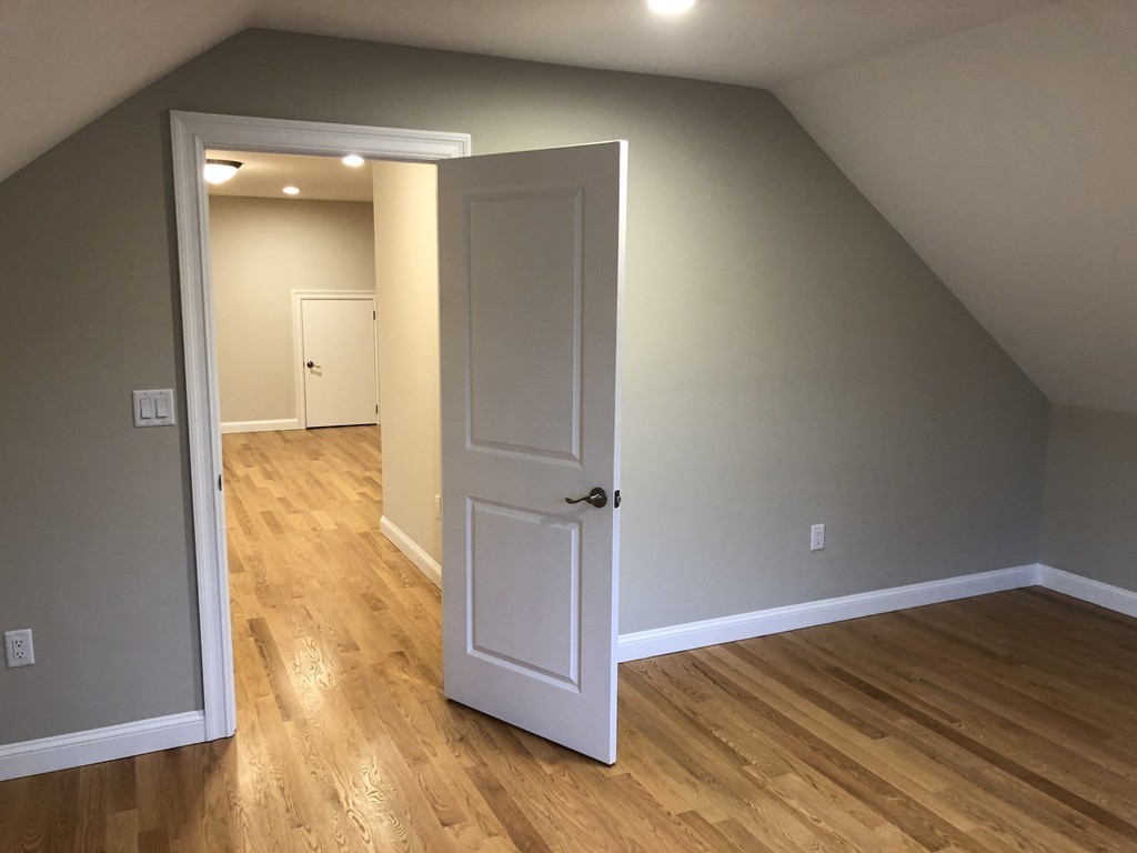 88 Bridge Street Lexington, MA 02421 - Photo 24 of 30 wooden floor in an empty room