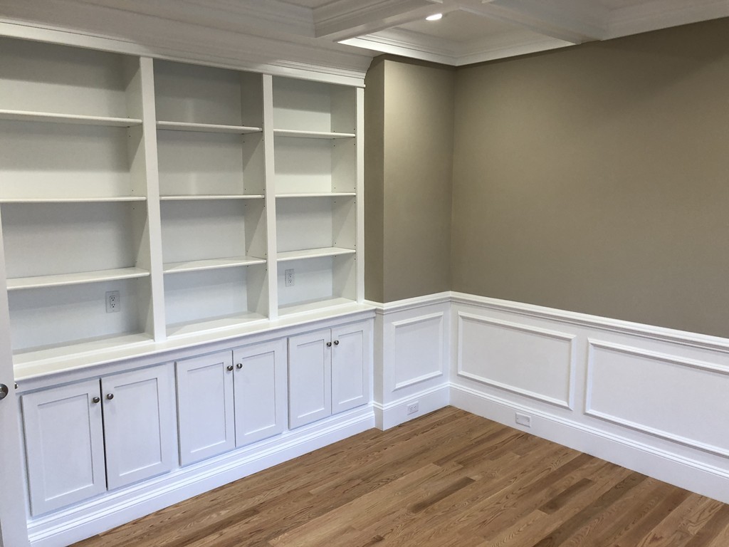 88 Bridge Street Lexington, MA 02421 - Photo 7 of 30 a view of an empty room with empty racks