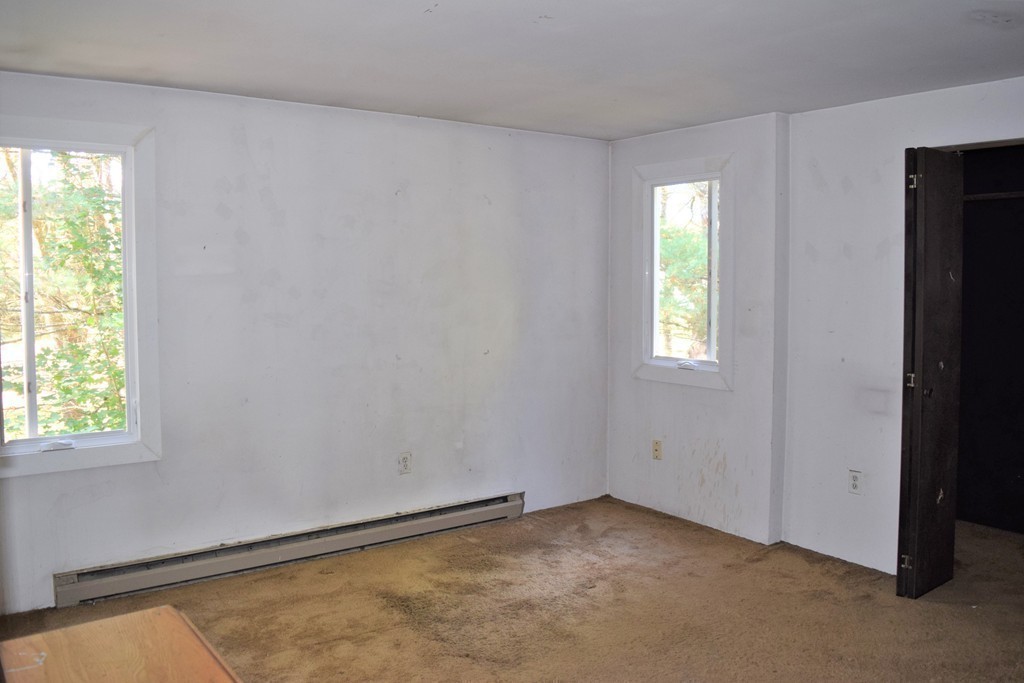 641 Wheelwright Road Barre, MA 01005 - Photo 16 of 26 an empty room with windows
