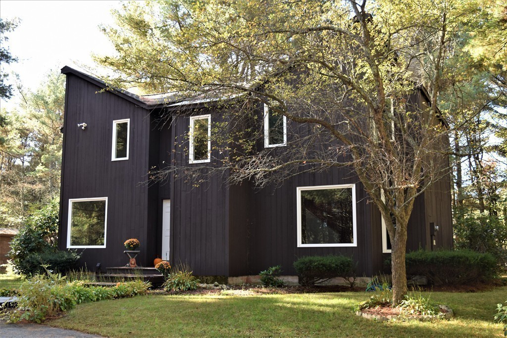 641 Wheelwright Road Barre, MA 01005 - Photo 2 of 26 a front view of a house with garden