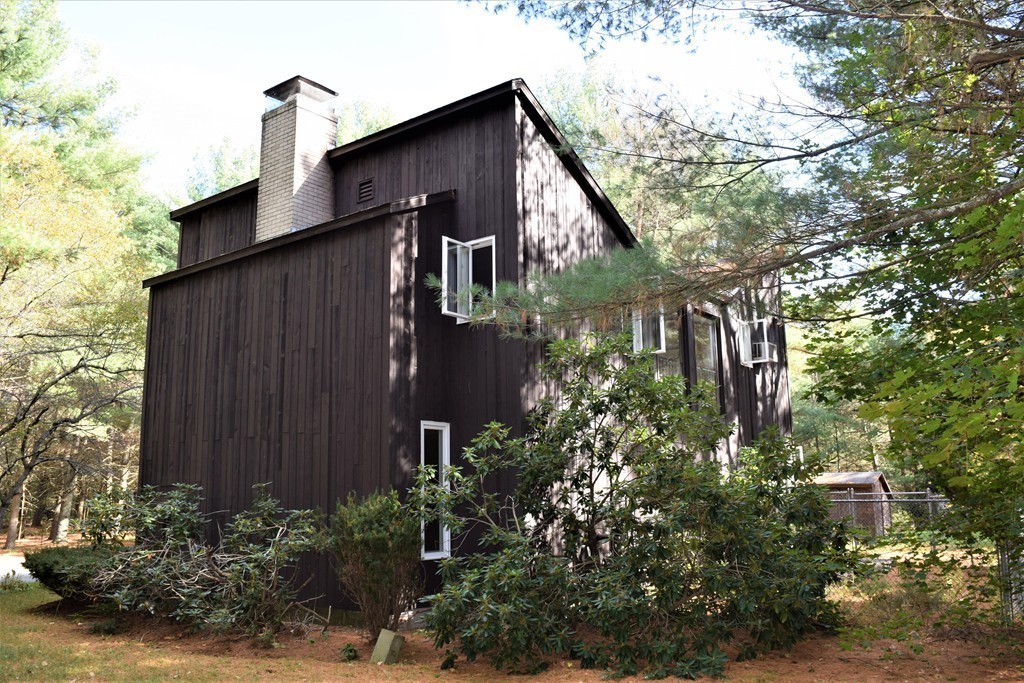 641 Wheelwright Road Barre, MA 01005 - Photo 25 of 26 a front view of a house with garden