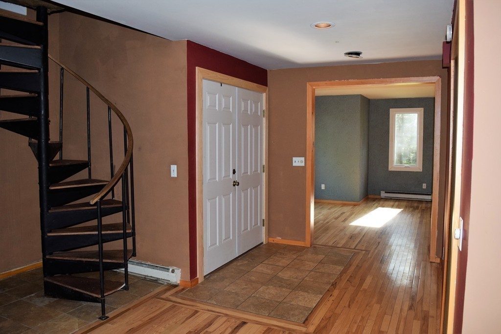 641 Wheelwright Road Barre, MA 01005 - Photo 8 of 26 wooden floor and windows in a room