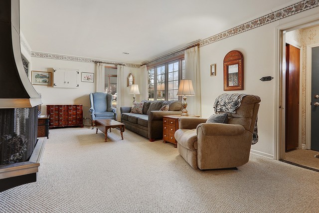 2324 Hawthorne Road Homewood, IL 60430 - Photo 2 of 10 a living room with furniture and a large window