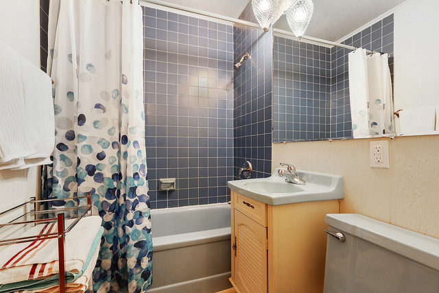 2324 Hawthorne Road Homewood, IL 60430 - Photo 6 of 10 a bathroom with a sink toilet and shower