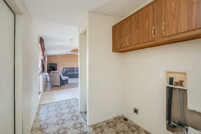 a kitchen with a refrigerator a sink and dishwasher