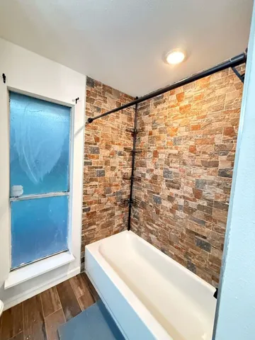 a bathroom with a bathtub