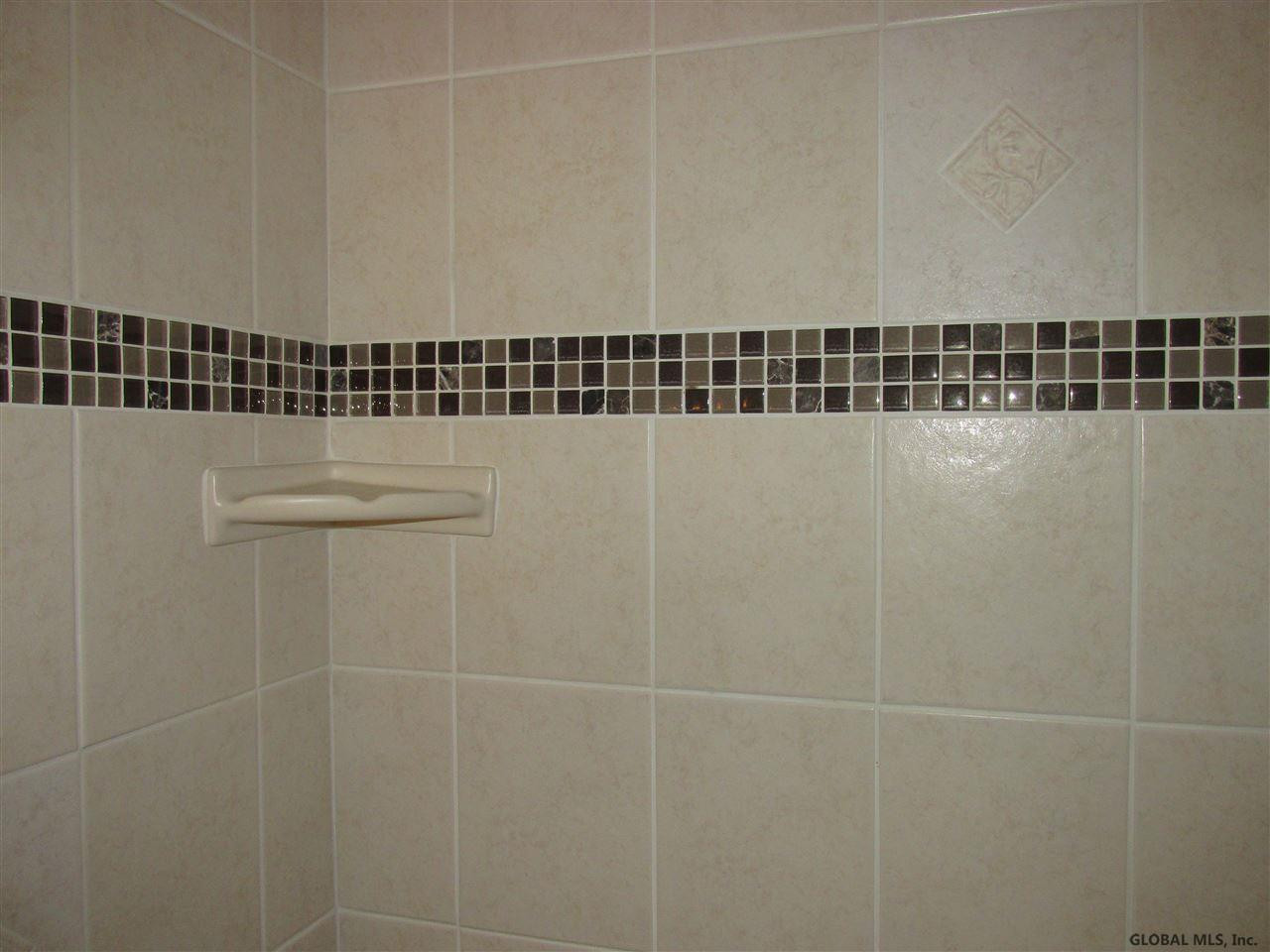 787 Curry Road Rotterdam, NY 12306 - Photo 10 of 14 Shower tile detail