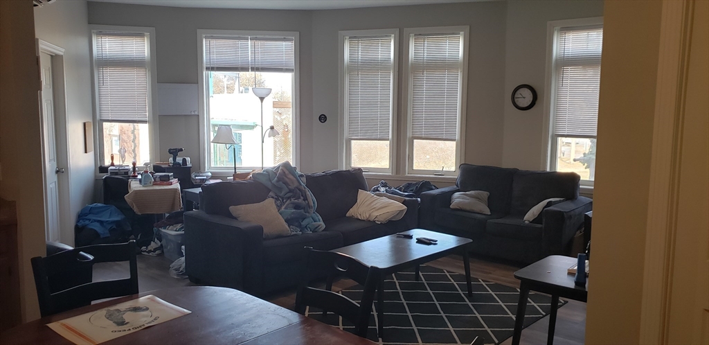95 Park Street, Unit 1 Attleboro, MA 02703 - Photo 3 of 6 a living room with furniture