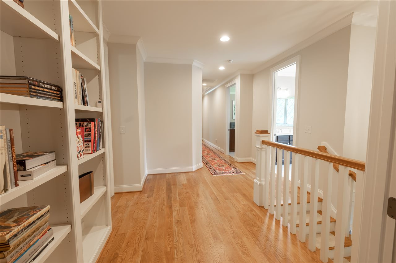 1437 Tacketts Pond Drive Raleigh, NC 27614 - Photo 13 of 30 The 2nd floor landing offers built -in shelving that can be used to store all your collectibles or used as a mini library! Landing