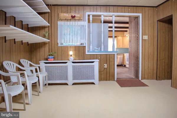 an empty room with shelves