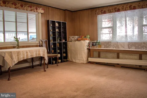 a bed room with a bed and a window