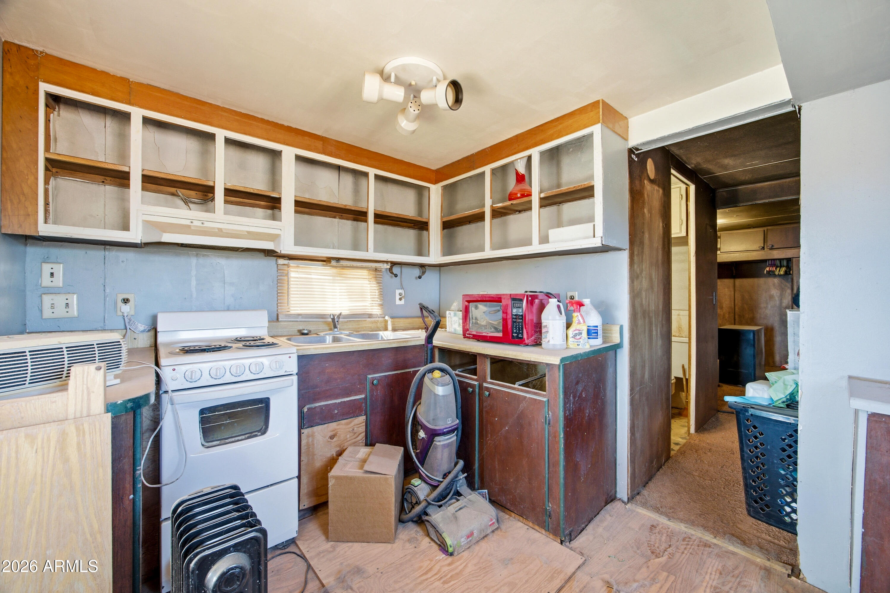 4394 Keats Road, Unit 52 Snowflake, AZ 85937 - Photo 22 of 33 a storage room with a stove and a refrigerator