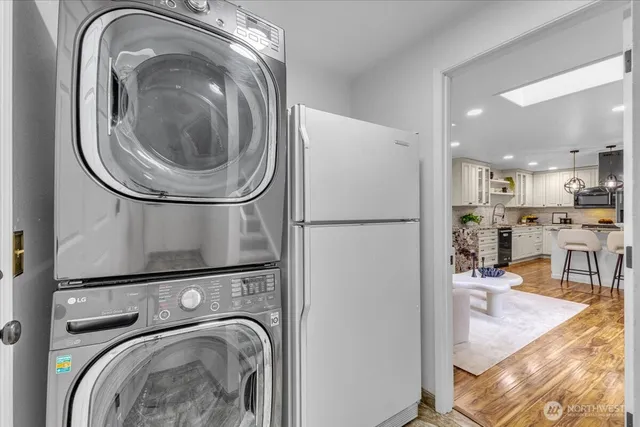 a view of a kitchen with washer and dryer