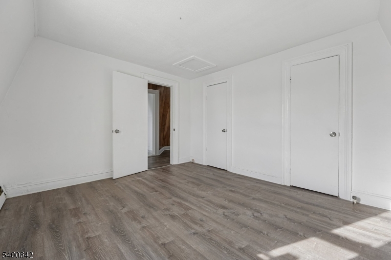 24 Franklin Place Summit, NJ 07901 - Photo 22 of 36 a view of an empty room with wooden floor