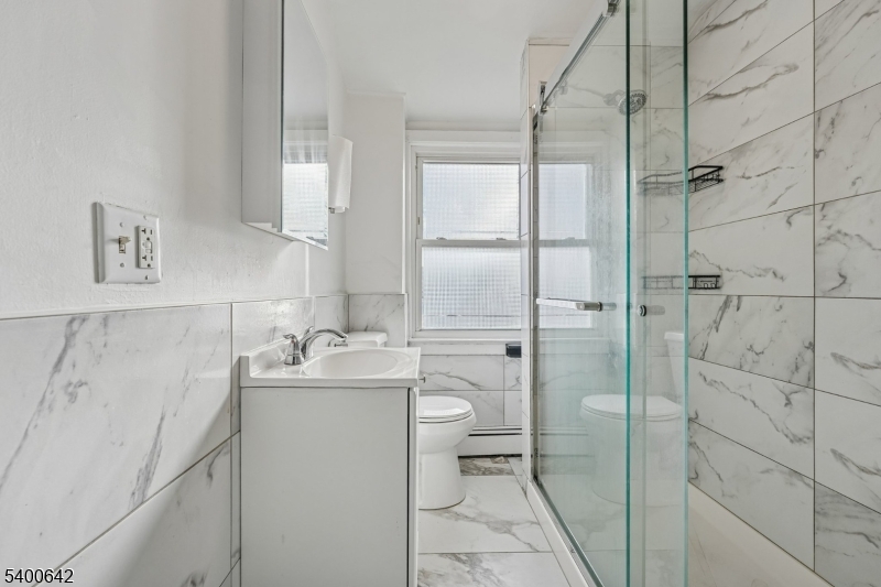 24 Franklin Place Summit, NJ 07901 - Photo 23 of 36 a bathroom with a sink toilet and shower