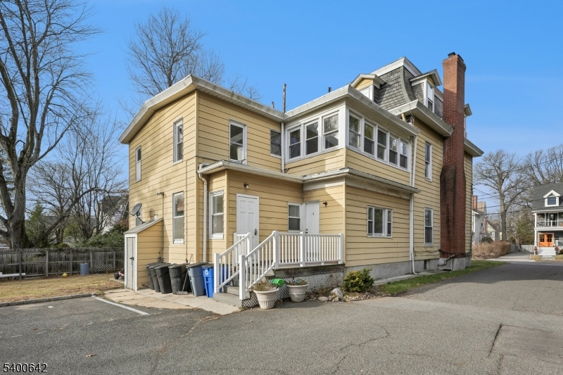 24 Franklin Place Summit, NJ 07901 - Photo 32 of 36 a view of a house with a yard