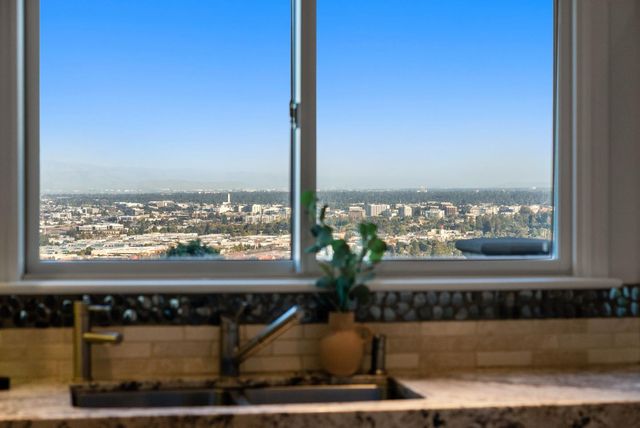 a view of a chairs and table in the terrace