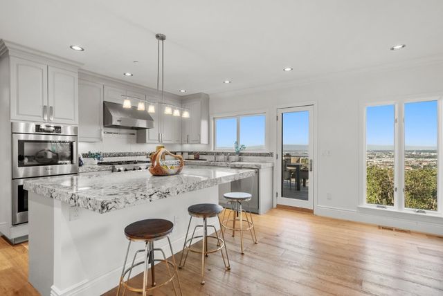 a view of a terrace with furniture and a table and chairs