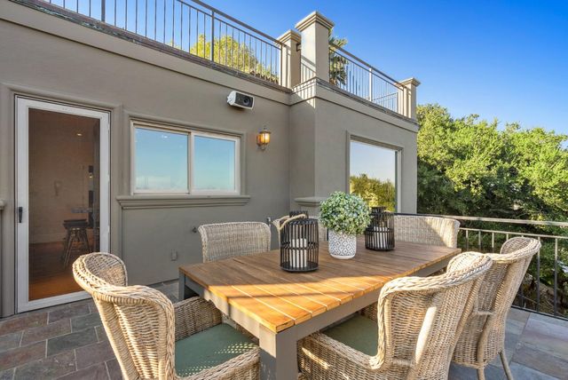 a bathroom with double sink and a mirror