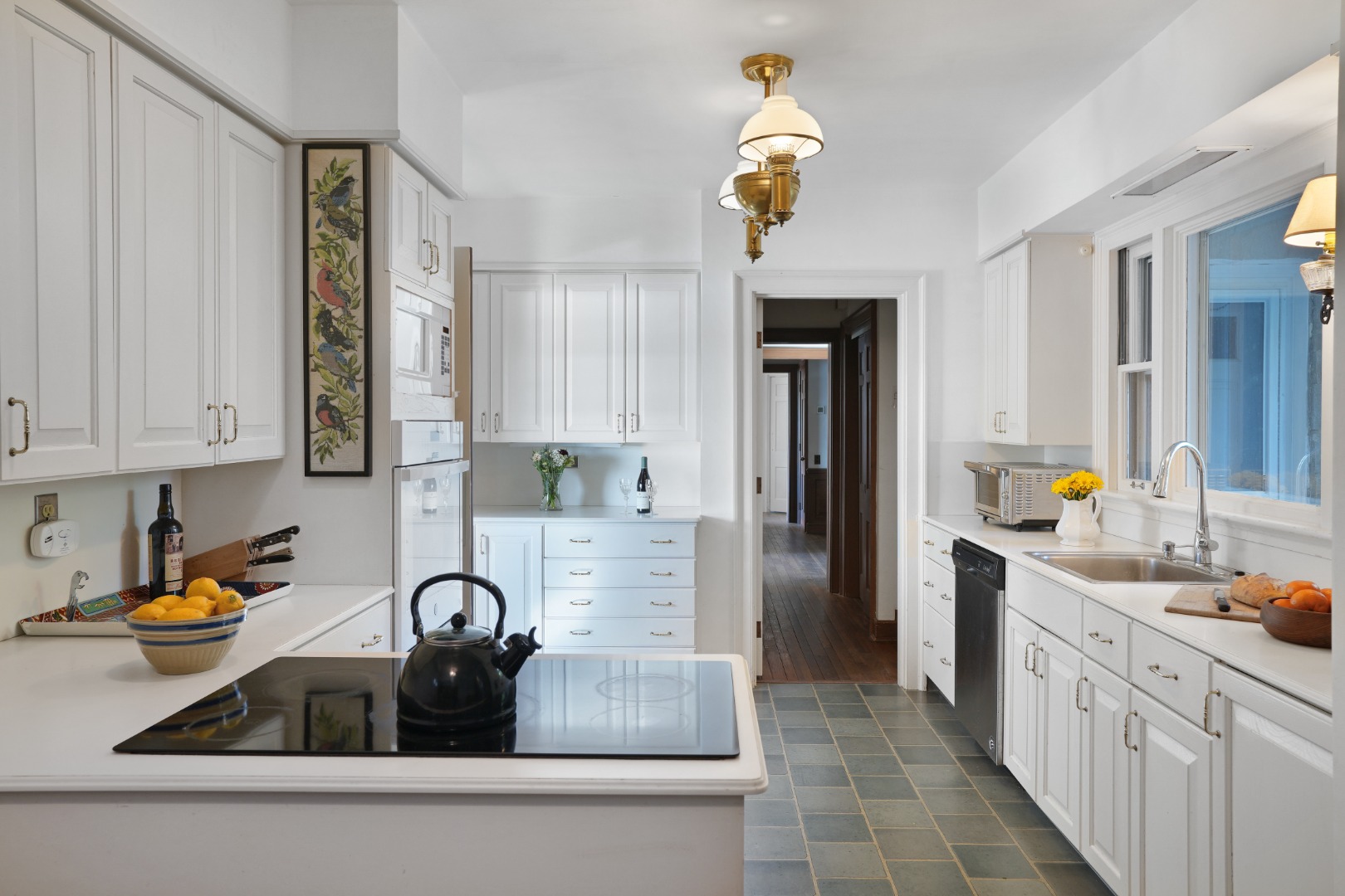 57 Hines Point Road Vineyard Haven, MA 02568 - Photo 16 of 29 a kitchen with a sink and a cabinets