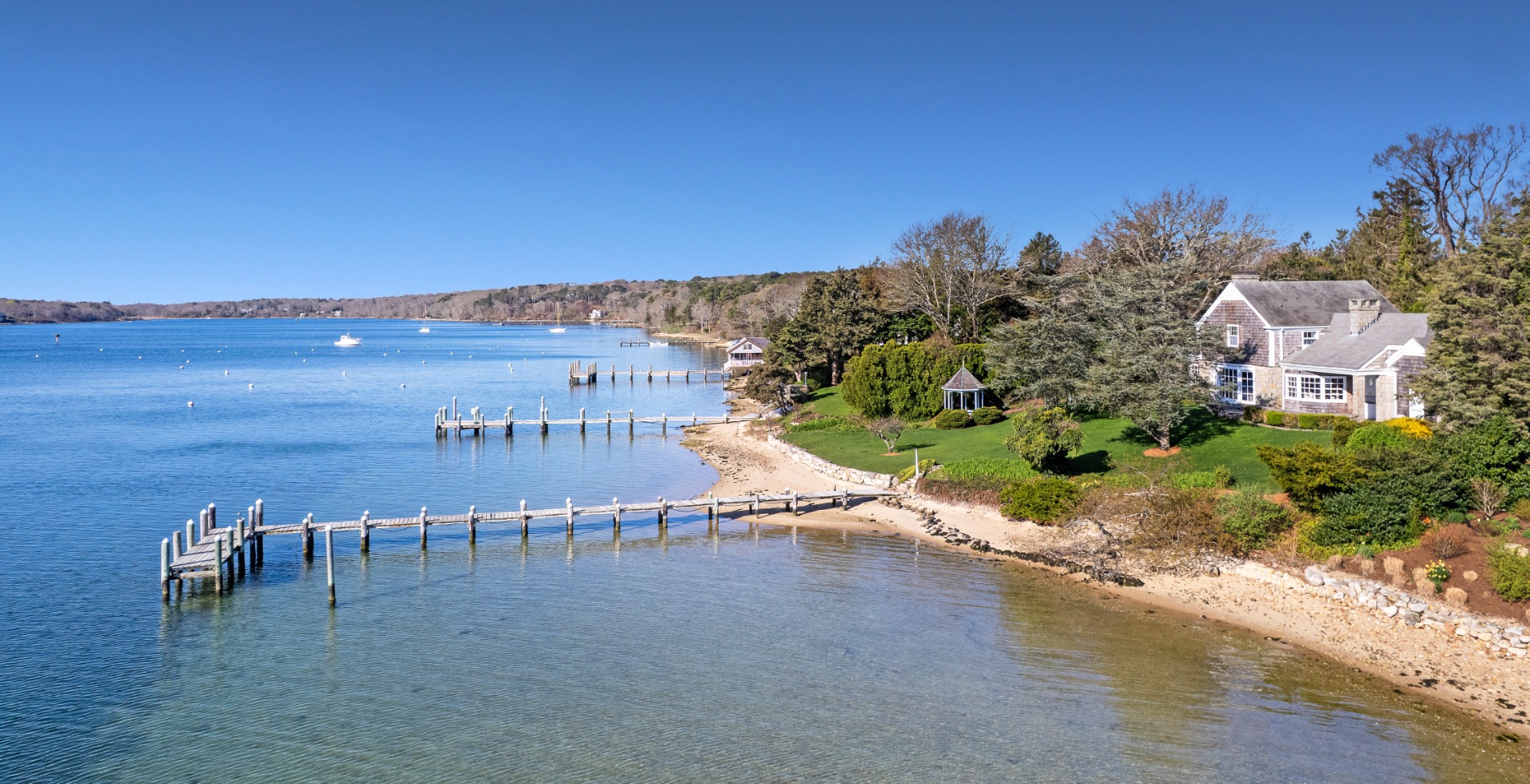 57 Hines Point Road Vineyard Haven, MA 02568 - Photo 2 of 29 a view of a building with outdoor space