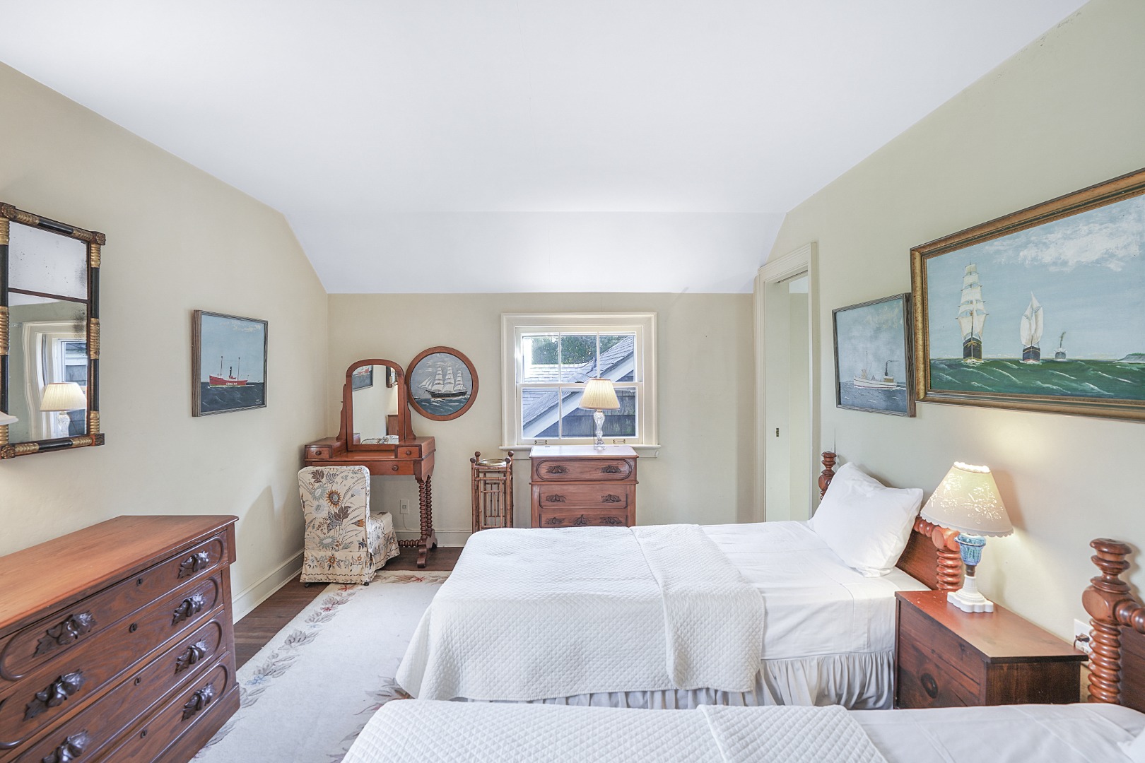 57 Hines Point Road Vineyard Haven, MA 02568 - Photo 21 of 29 a bedroom with a bed and dresser with mirror