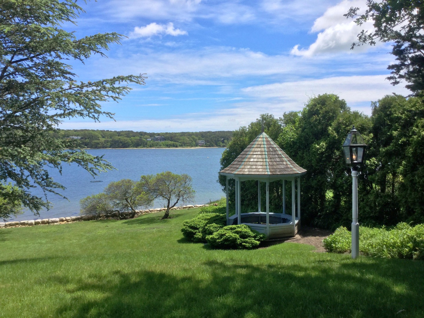 57 Hines Point Road Vineyard Haven, MA 02568 - Photo 25 of 29 a front view of a house with garden
