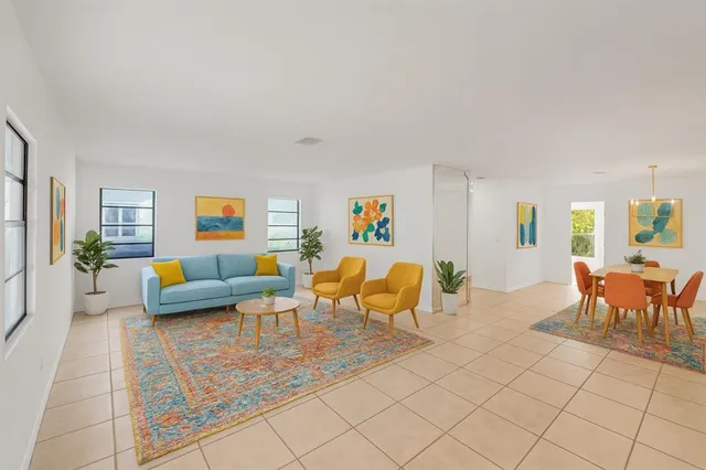 a living room with furniture and a couch