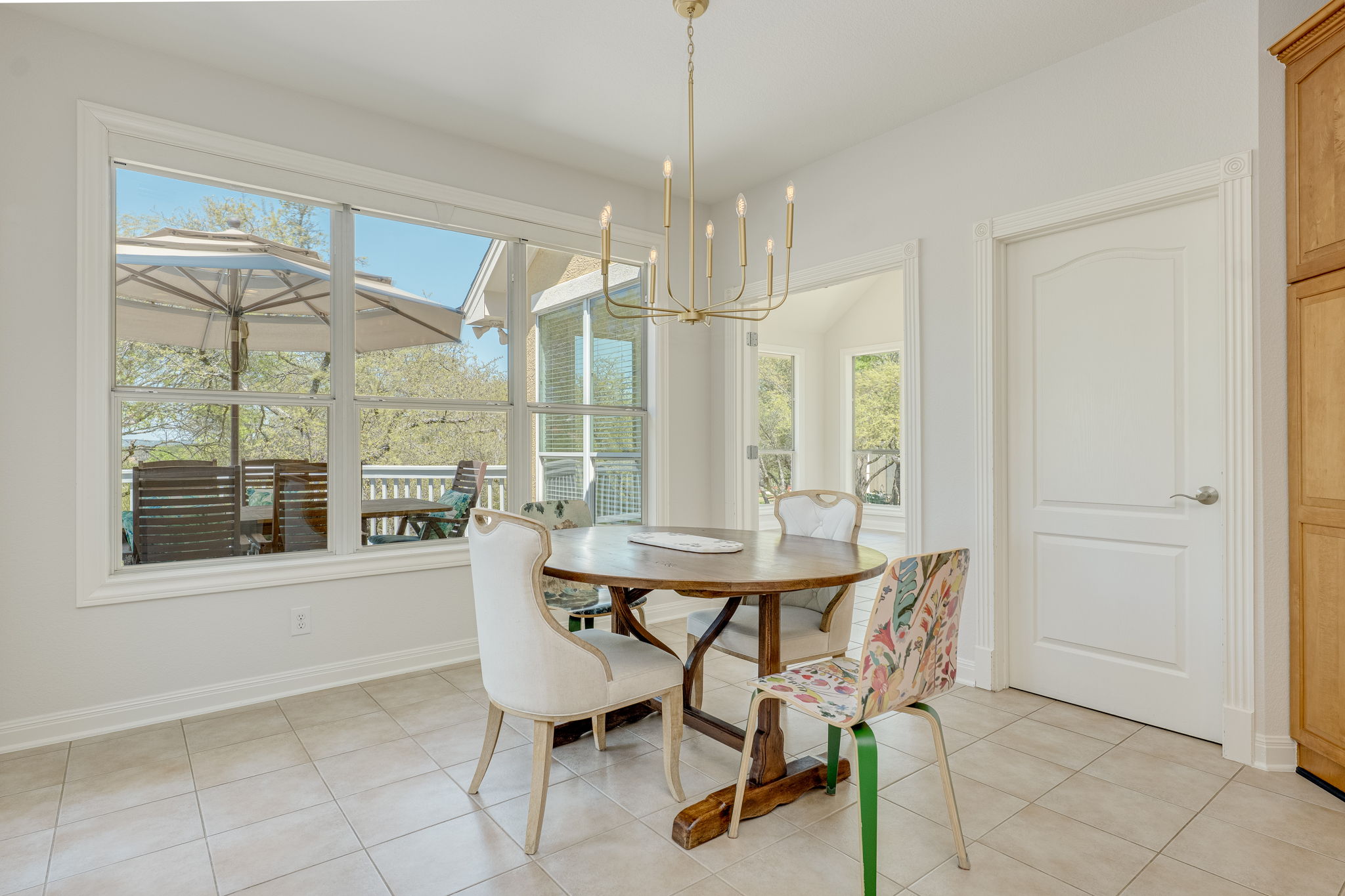 4424 Lago Viento Austin, TX 78734 - Photo 14 of 38 This photo of the breakfast area also shows the entrance to the sunroom and walk-in pantry.