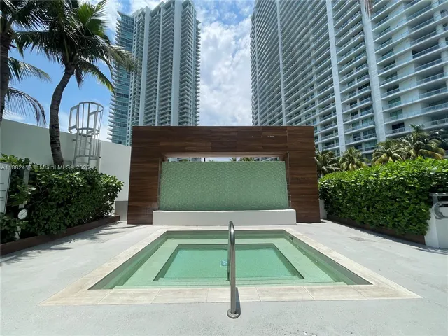a view of outdoor space with a swimming pool