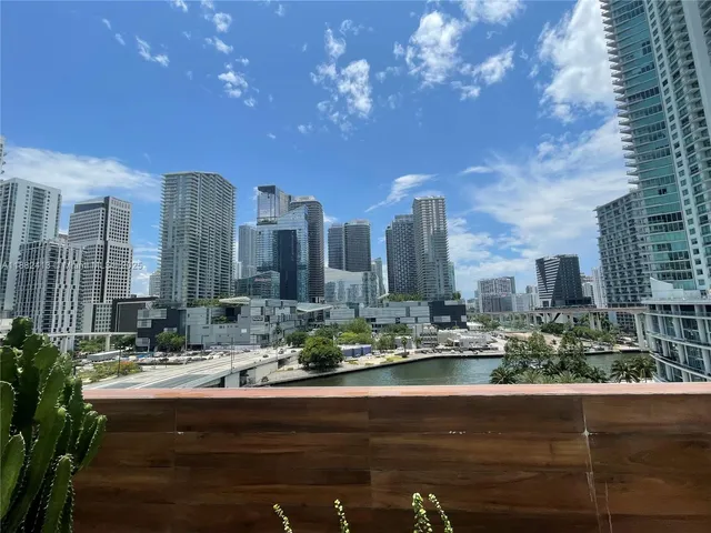 a view of a city with tall buildings