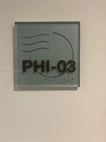 a bathroom with a granite countertop sink and mirror