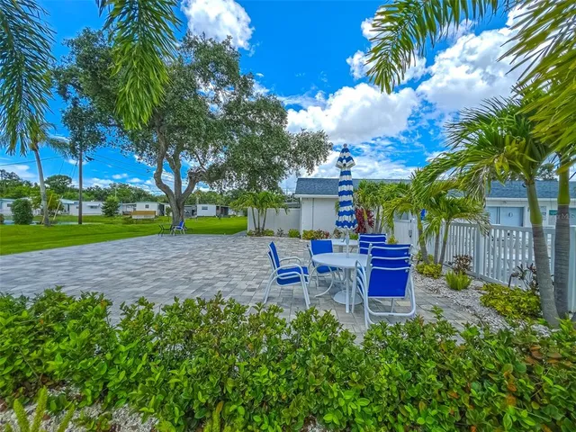 a view of a brick building with many windows