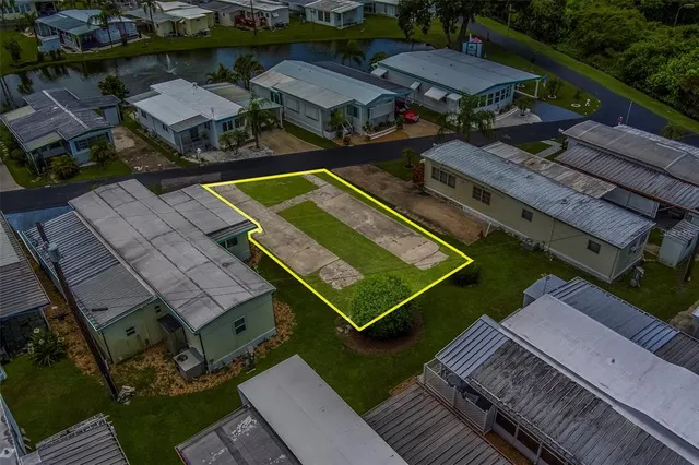 an aerial view of a house with a garden