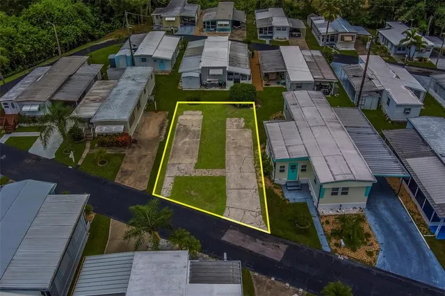 an aerial view of a house with a garden