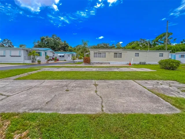 a view of a house with swimming pool