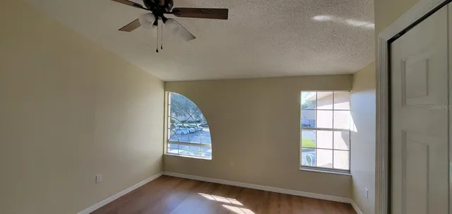 a bathroom with a sink a toilet and a shower