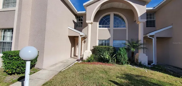 a house view with a outdoor space