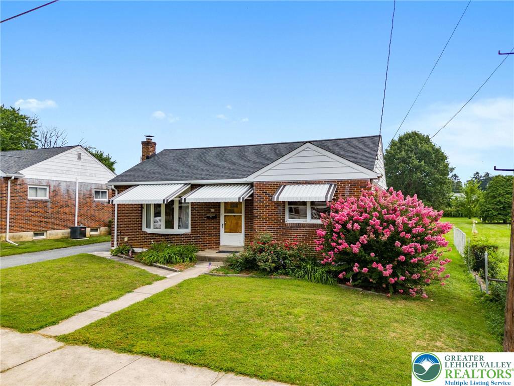 515 Franklin Street Emmaus, PA 18049 - Photo 1 of 45 a front view of a house with a garden