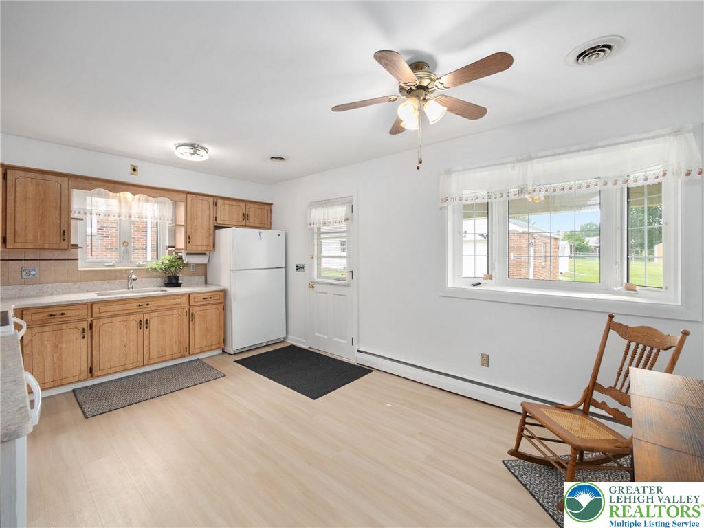 515 Franklin Street Emmaus, PA 18049 - Photo 28 of 45 a kitchen with white cabinets and white appliances