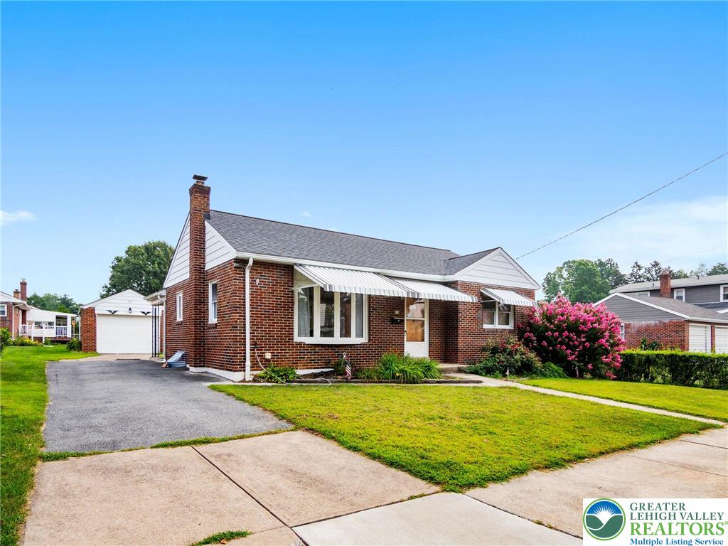 515 Franklin Street Emmaus, PA 18049 - Photo 6 of 45 a front view of a house with a yard and potted plants